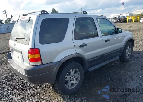 2003 Ford Escape Xlt z USA, uszkodzony, nr VIN 1FMCU93113KA90810